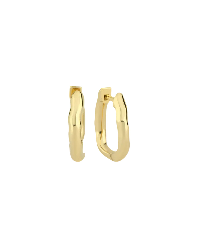 A single gold-colored hoop earring.