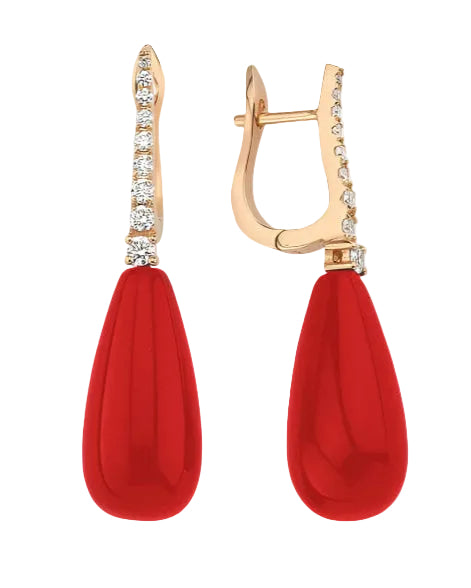 A pair of gold earrings featuring red coral teardrop pendants with gold hoop closures, adorned with small round diamonds.