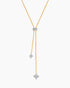 Gold necklace with star-shaped pendants on a white background