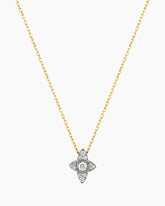 Gold necklace with a diamond pendant on a white background