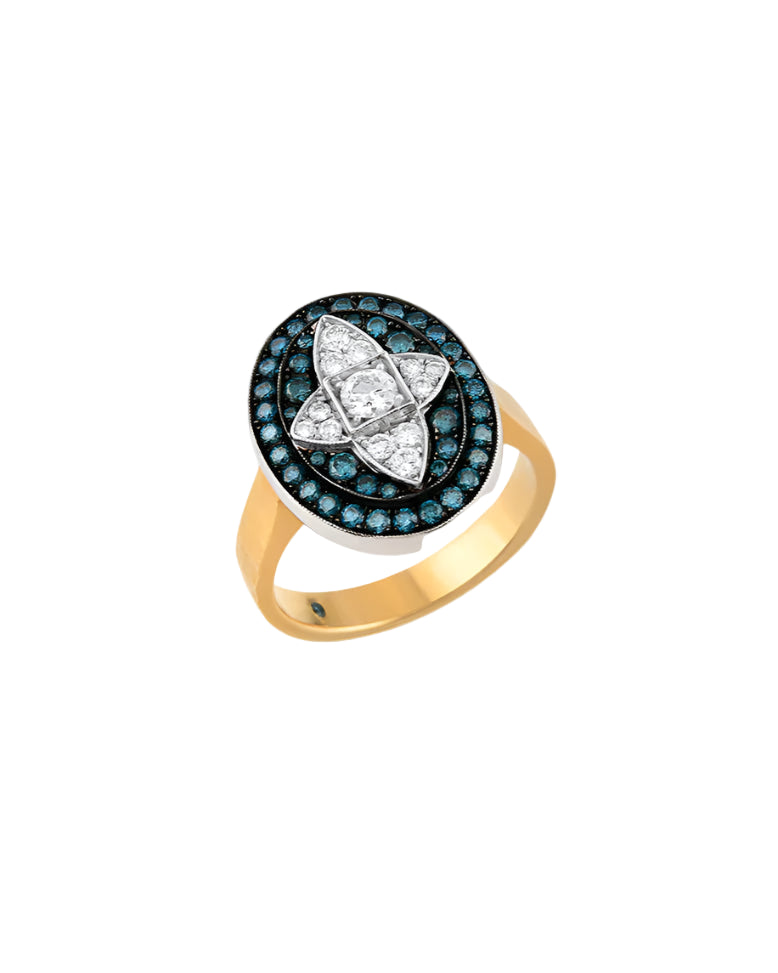 Gold ring with a diamond and blue gemstone design on a white background