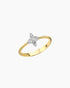 Gold ring with a diamond bow-shaped design on a white background