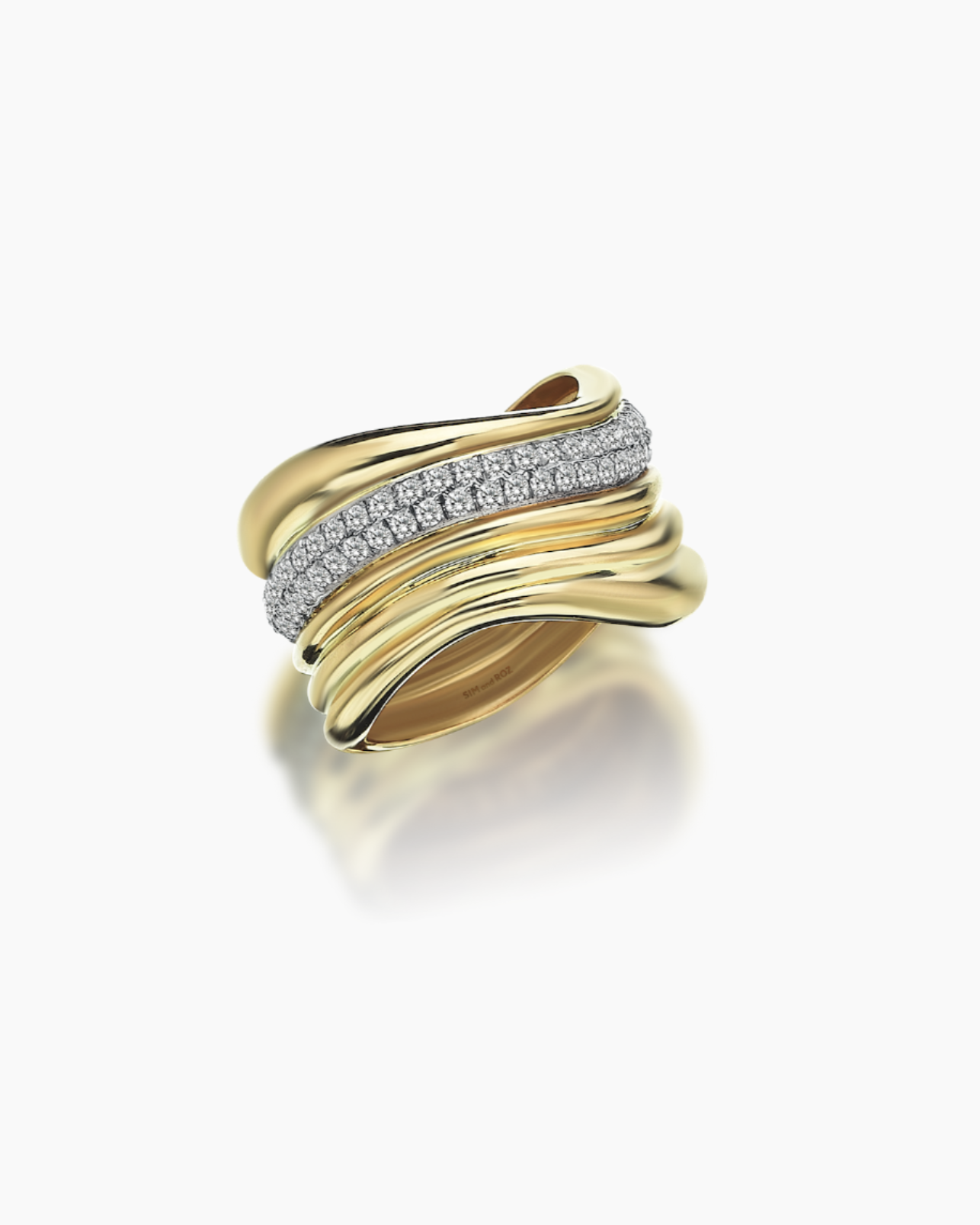 Gold ring with diamond accents on a white background