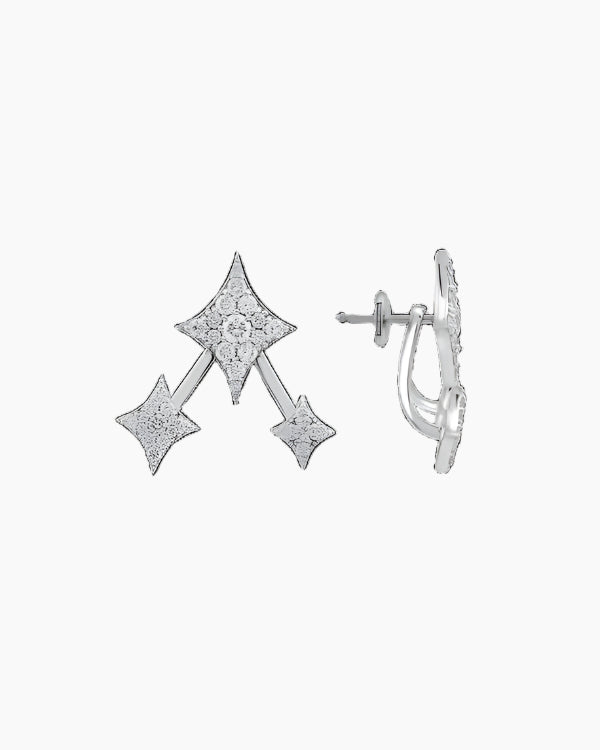 A pair of white gold ear jacket earrings with diamond embellishments in a geometric star design.