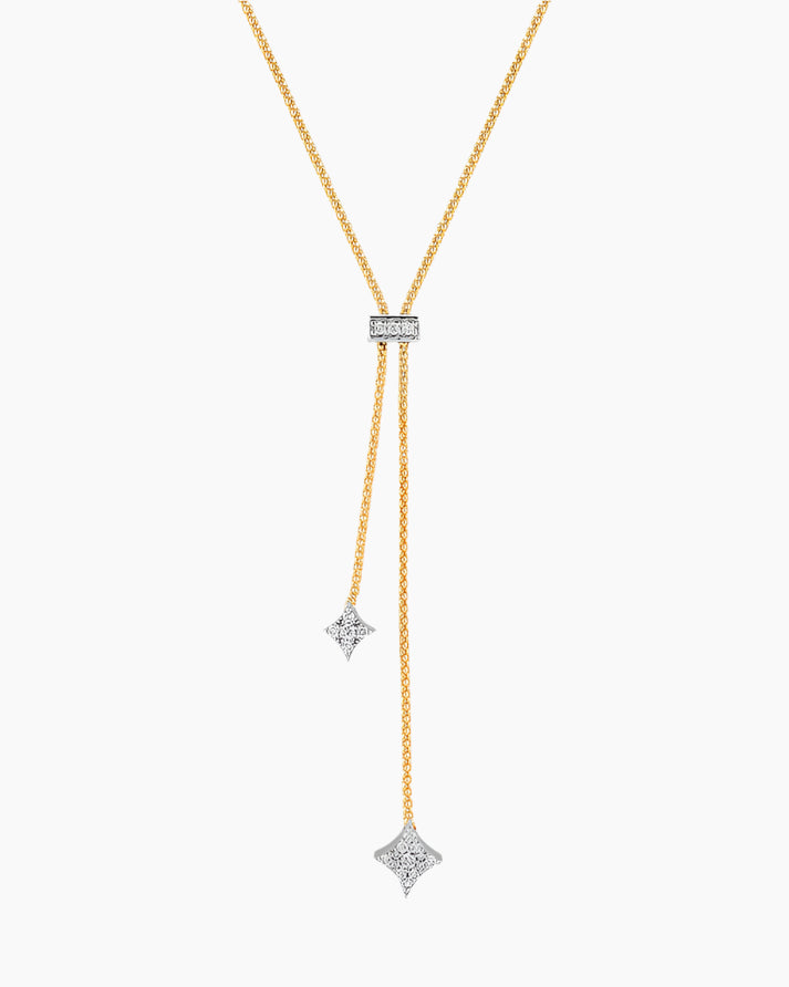 Gold necklace with star-shaped pendants on a white background