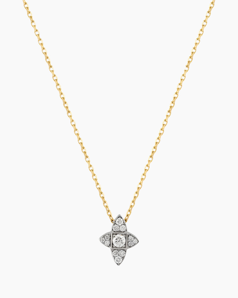 Gold necklace with a diamond pendant on a white background