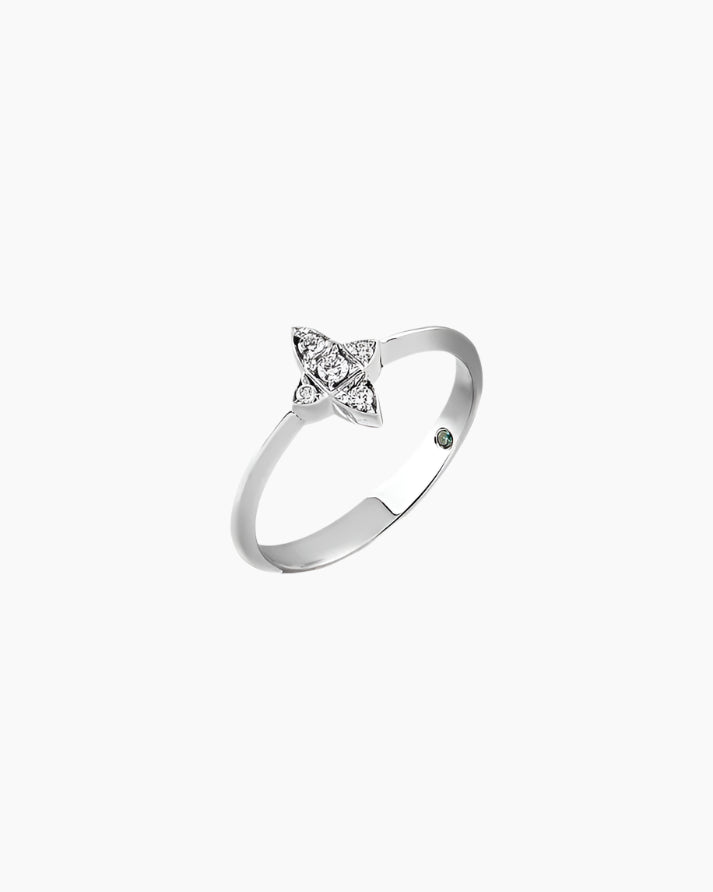 Silver ring with a diamond on a white background